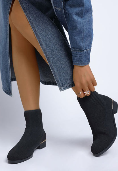 Top angle of black Rosamund Sock Boots with knitted sock fit and cushioned insole.