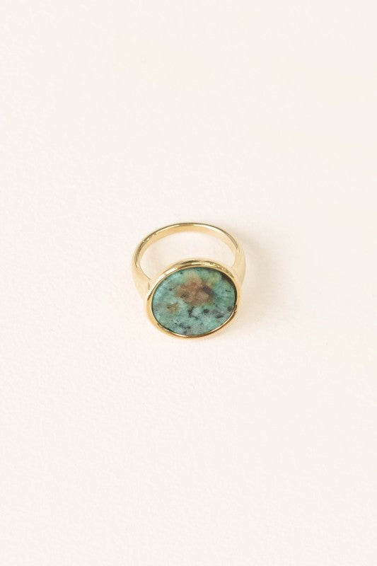 Front angled view of Ambition Stone Ring in Pine with unique stone pattern.
