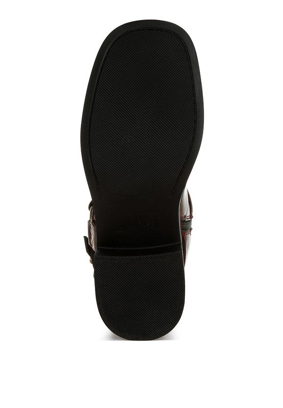 Bottom view of burgundy Caribou Boots highlighting durable TPR sole design.