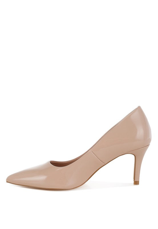 Blush patent leather stiletto heel pumps with a closed point toe. Features a 3-inch stiletto heel, cushioned insole, and made from patent faux leather.