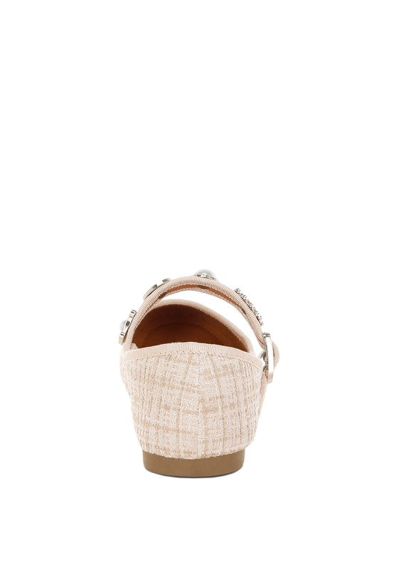 Back view of beige Noyama Tweed Mary Jane flat highlighting the flat heel and textured tweed fabric.