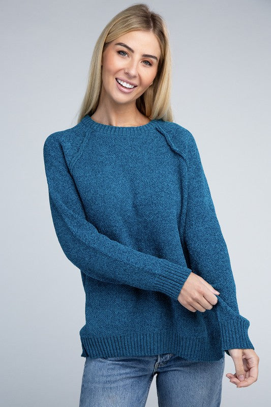 Ocean teal round neck chenille sweater with long raglan sleeves, relaxed fit, and hip-length cut.