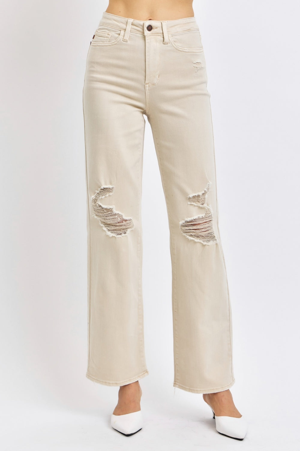 Bone-colored high-waisted wide-leg jeans with distressed details pockets, stretch denim with zip fly.