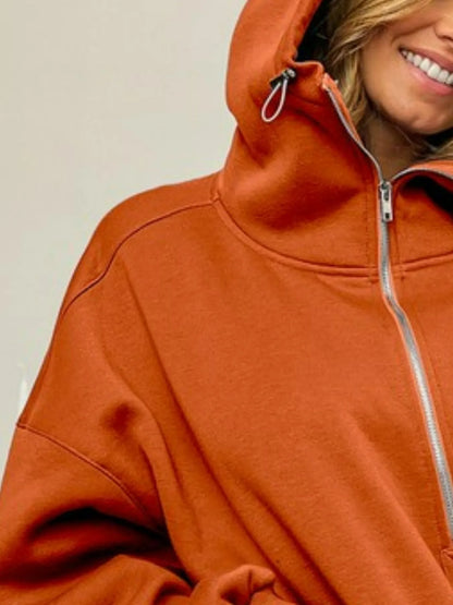 Close-up of the Blaire Fleece Hoodie showing the half zip detail and vintage-washed hooded neckline.