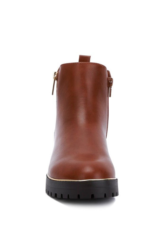 Front view of Tan Thorin Block Heel Boots with closed round toe, zipper detail, and low block heel.