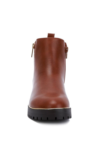 Front view of Tan Thorin Block Heel Boots with closed round toe, zipper detail, and low block heel.