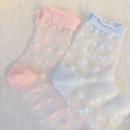 Close-up of pink and blue Sweet Hearts Sheer Socks highlighting sheer detail.