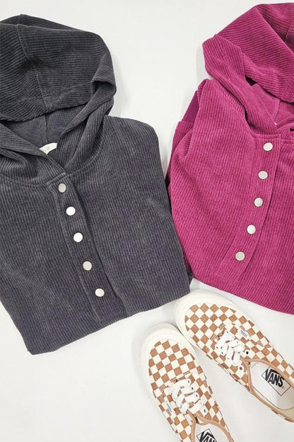 Charcoal and magenta Kenzie Plus Size Hooded Sweatshirts folded side by side with button details.