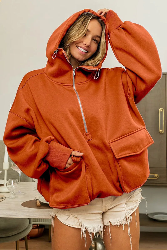 Front view of the Blaire Half Zip Vintage Washed Fleece Hoodie showcasing the oversized fit, front pocket, and half zip detail.