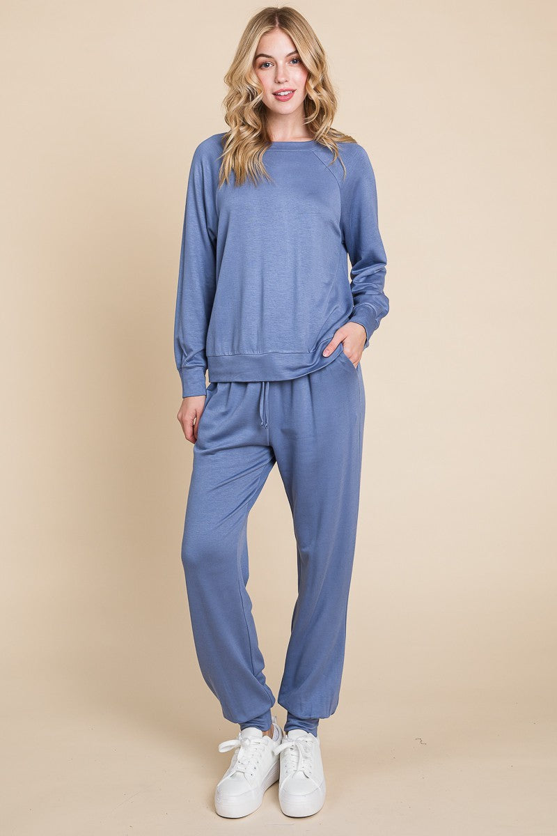 Powder Blue lounge set with a round-neck top, raglan sleeves, and drawstring pants.