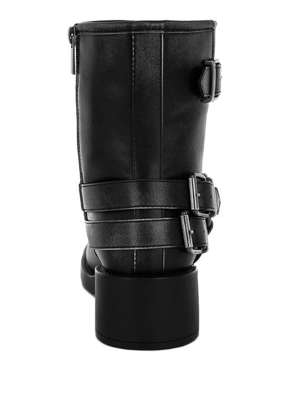 Back view of black Caribou Biker Boots with cushioned insole and sturdy heel.