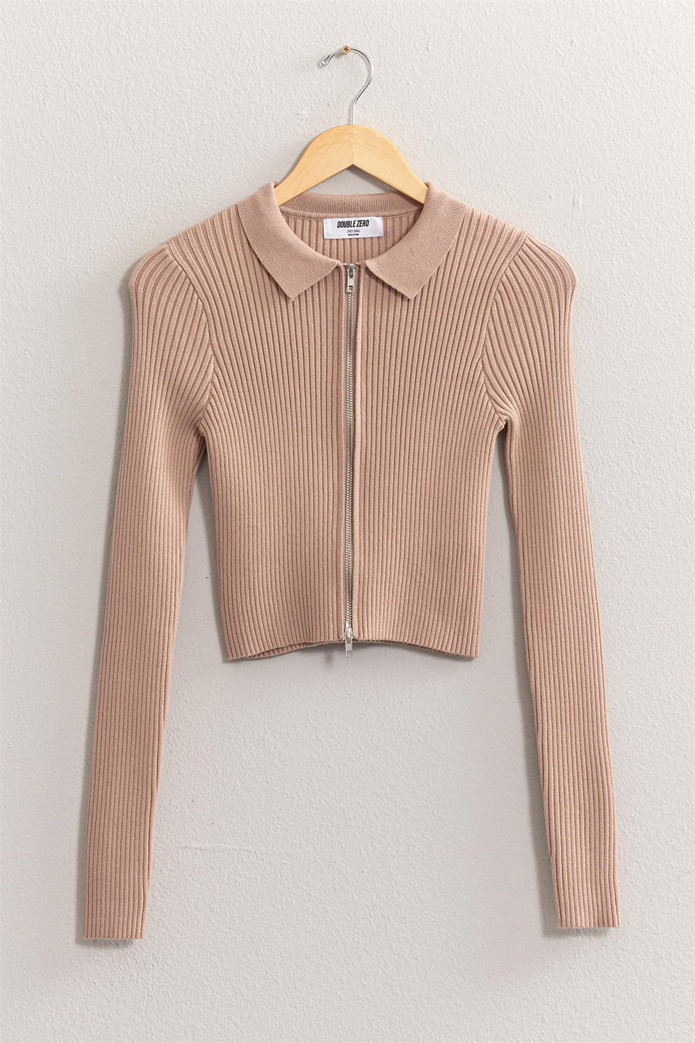 Women's taupe ribbed sweater with a collared neckline, long sleeves, cropped length, and a zipper closure.