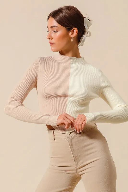 Front view highlighting cropped hem and ribbed knit of Bess Color Block Sweater.