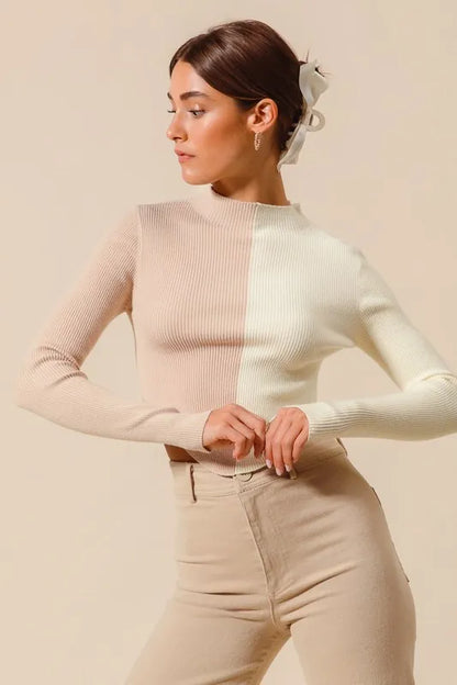 Front view highlighting cropped hem and ribbed knit of Bess Color Block Sweater.