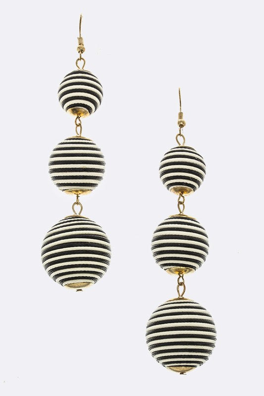 Navy ball drop earrings with a 4-inch drop.