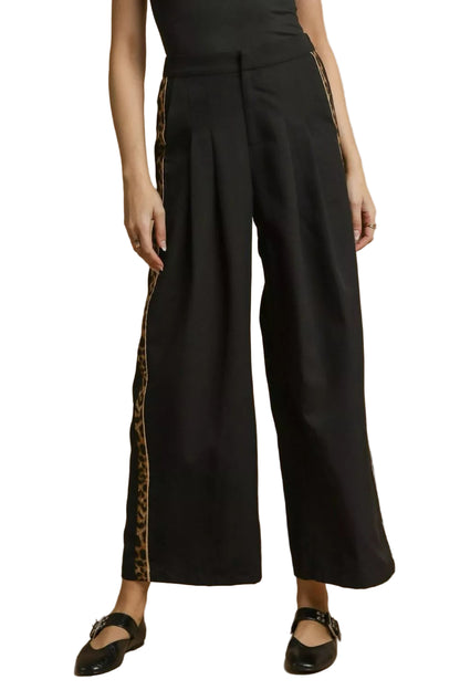 Front view of Cedar black wide-leg pants with leopard trim