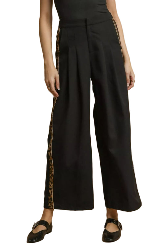 Front view of Cedar black wide-leg pants with leopard trim