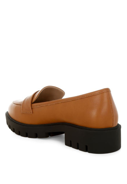 Peridot Chunky Loafers in tan back view highlighting chunky block heel and sturdy lug sole.