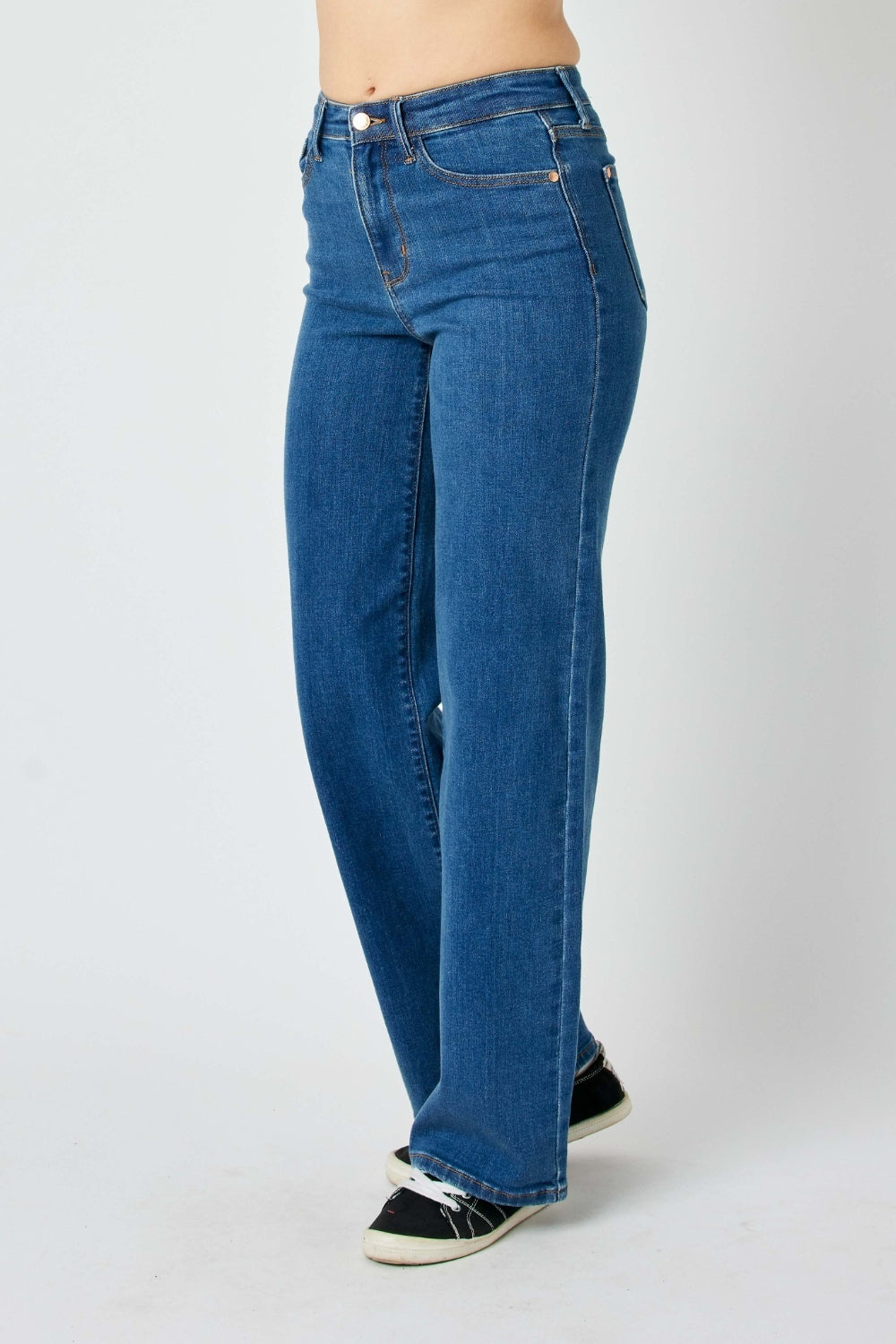 Judy Blue high-rise straight leg jeans in a medium wash with moderate stretch.