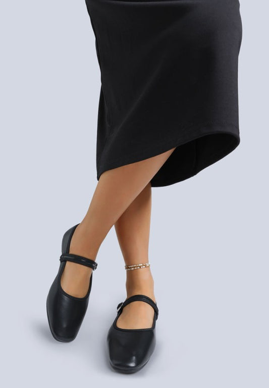 Iker Classic Pin Buckle Ballerinas in black, almond toe flat shoes front view.