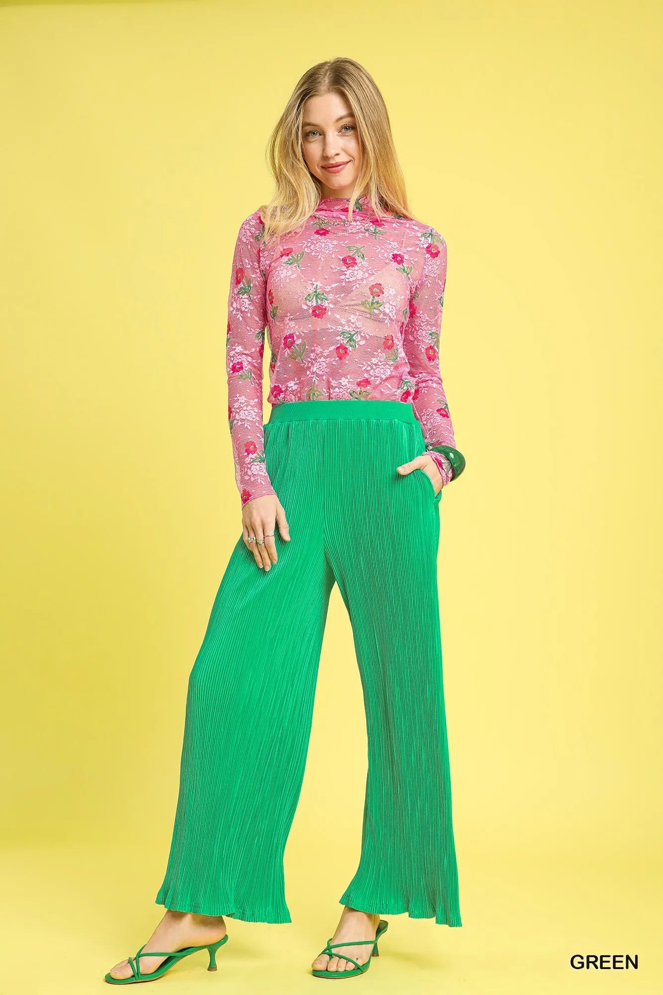 Model in Hadlee green textured pants, wide-leg high-waist cut with breezy ankle length.