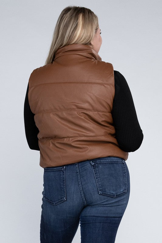 Plus Size Puff Vest in brown, featuring a relaxed fit, zip closure, pockets, and a collar neckline. 