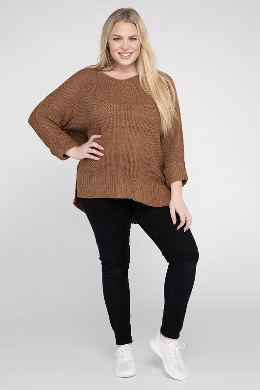 Coco plus size crew neck sweater with a loose fit, side slits, long sleeves, and a cozy knit fabric for warmth.