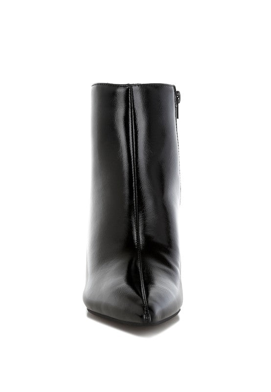 Black faux leather kitten heel boots with a closed point toe, 2.5-inch heel, and zipper fastening. Features paneling detail, elasticated gussets, and comfortable cushioned insoles.