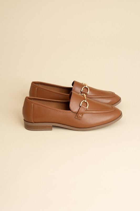 Cognac Horsebit Loafers with guitar motif, featuring horsebit detailing, slip-on style, and flat heel.