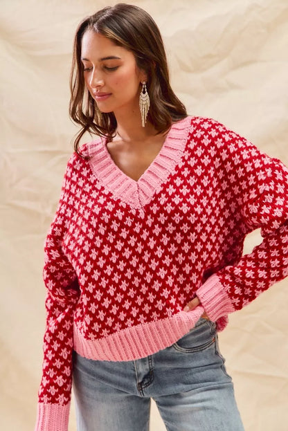 Cozy Chloe V-neck sweater in red and pink, relaxed oversized knit front pose.