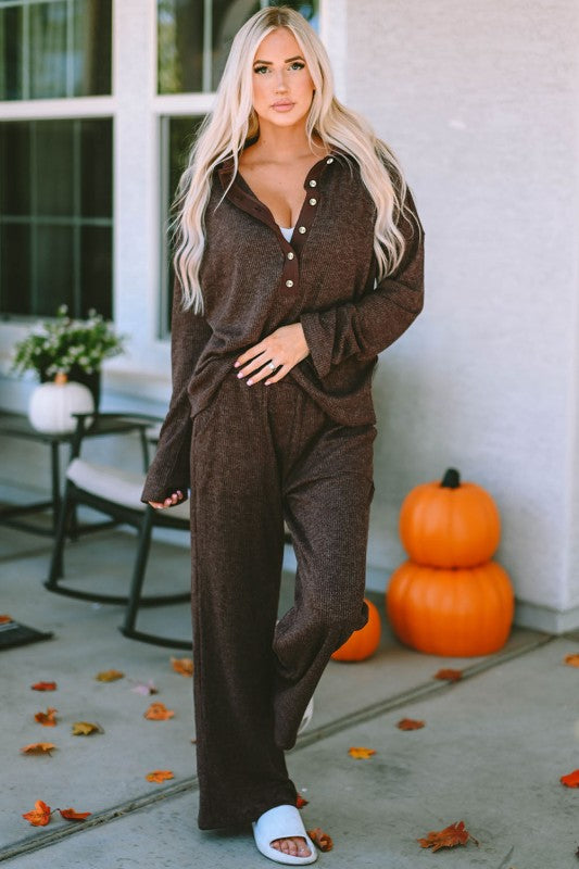 Woman modeling Brooke Ribbed Lounge Set, ribbed knit Henley top and wide-leg pants styled casually