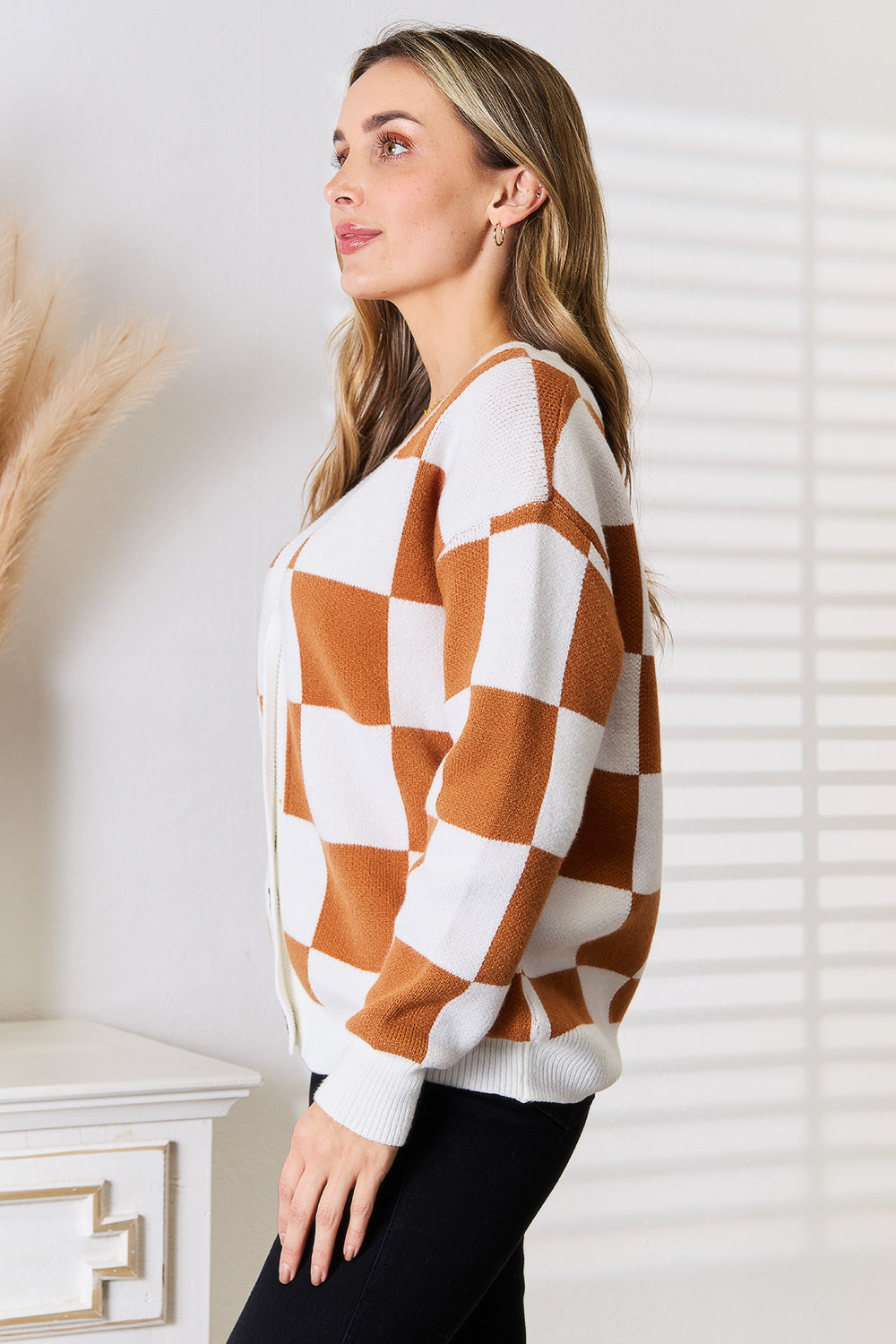 Side profile of Tauni Checkered Cardigan showing relaxed dropped shoulder fit