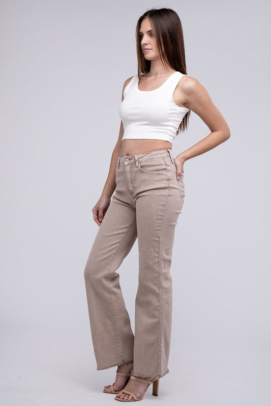 Ash mocha acid-washed straight wide-leg pants featuring a frayed cutoff hem, zip fly closure, and a relaxed fit. Made with stretchy fabric for comfort and a unique vintage-inspired look.