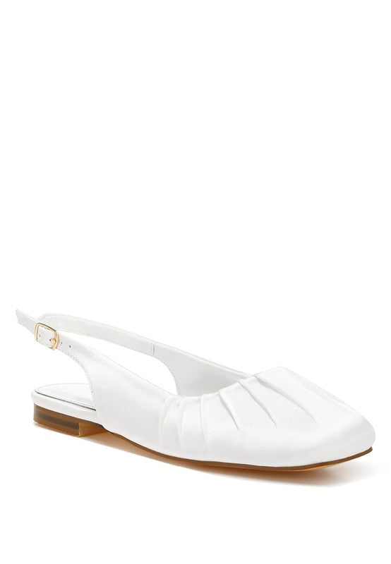 White satin slingback shoes with square toe, adjustable buckle strap, flat heel, and plush cushion insole.