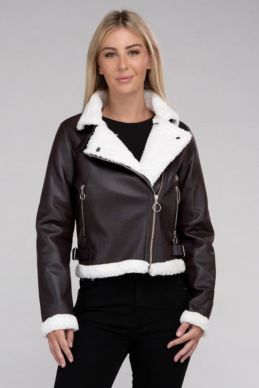 Brown vegan leather jacket with cozy teddy trim, zipper closure, and side pockets.