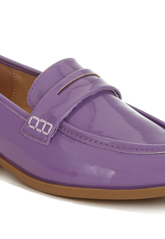 Close-up of Lilac Avery Patent Loafers highlighting polished finish and cushioned insole.