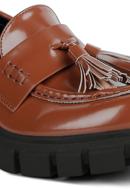 Close up of Jonah Platform Loafers in tan showing faux leather finish