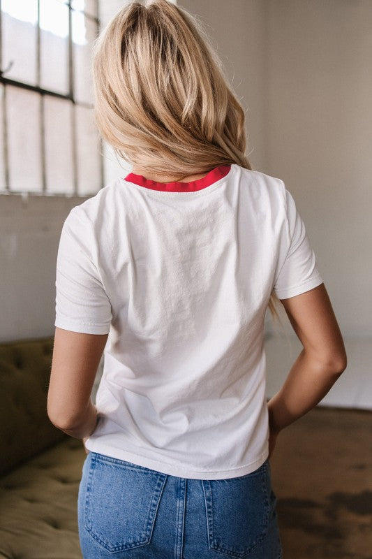 Solid back of Carter Rainbow Stripe Crewneck Top showing clean cotton knit finish.
