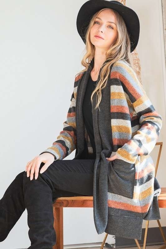Side view of Vinni Plus Size Cardigan with multicolor stripes and black patch pocket detail