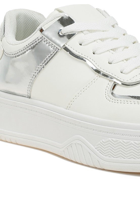 Close up of white Scouts Platform Sneakers showing lace-up and panel detail
