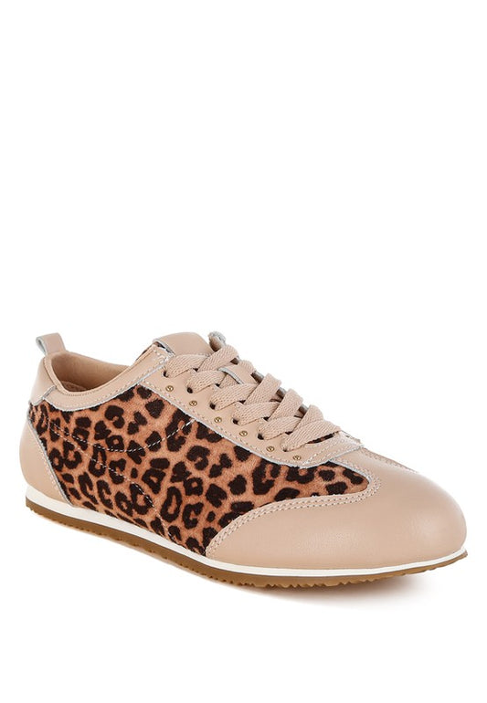 Leopard print and beige leather sneakers front angled view with stud embellishments and lace-up design.