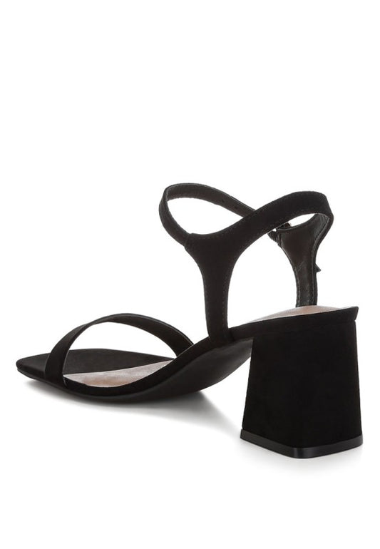 Back angle of black Akiya Square Toe Block Sandals with flared block heel.