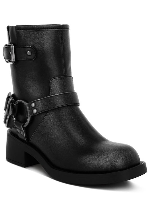 Black Caribou Biker Boots front angle showing round toe and belt strap design.