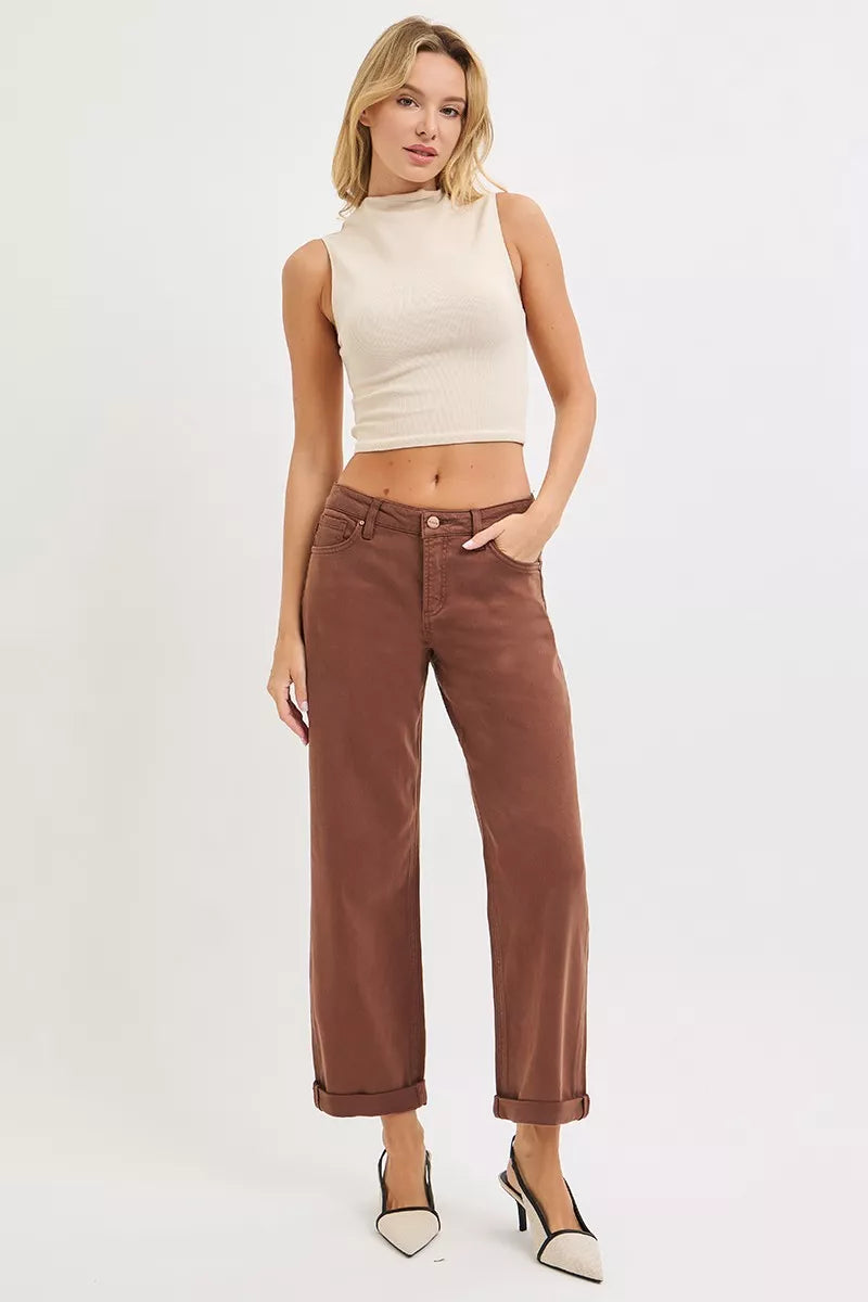 Nessa Cocoa Barrel Jeans seated lifestyle shot tummy control wide leg style.