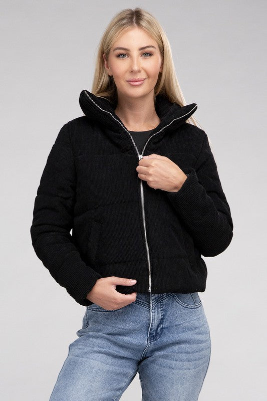 Black corduroy zip-up jacket with a high collar, long sleeves, and a pocket.