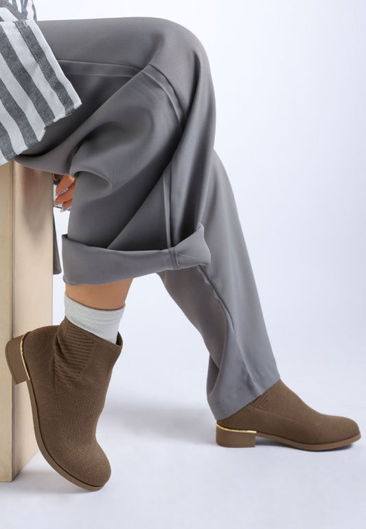 Side view of taupe Rosamund Sock Boots with sleek sock-like fit and stacked heel.