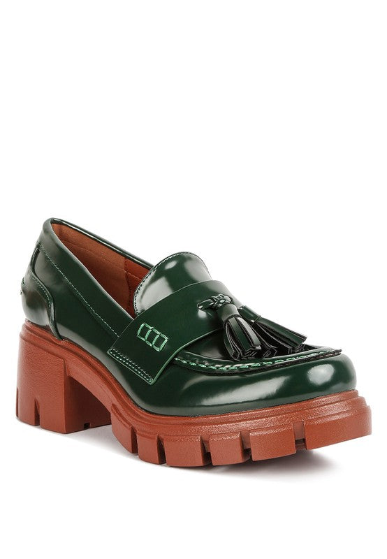 Front angle view of Jonah Platform Loafers in dark green with tassels