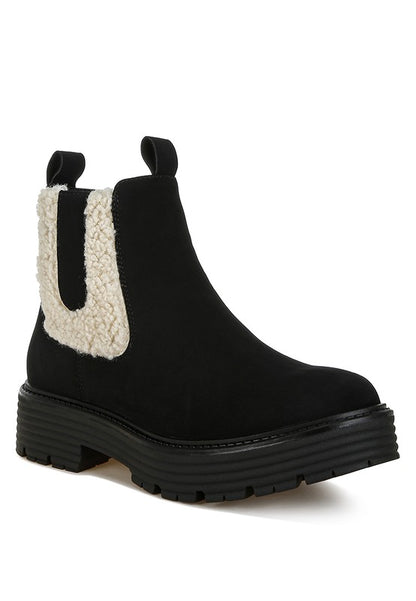 Front angle of Black Mothman Chunky Ankle Boots with faux fur trim and sturdy block heel.