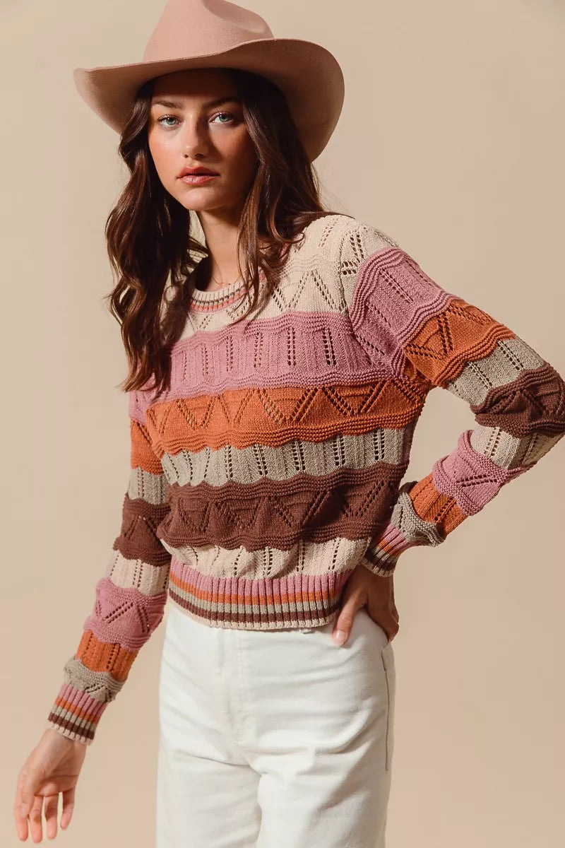 Nina Multi Color Wavy Stripe Sweater Top styled with jeans for casual outfit.