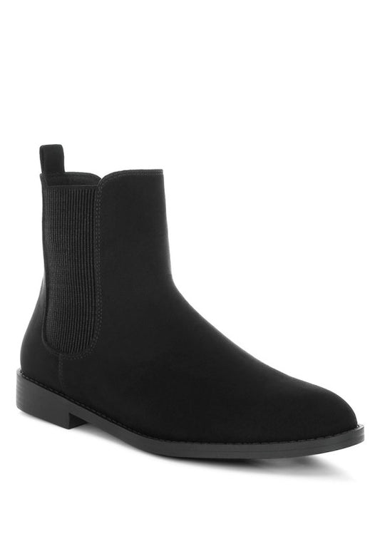 Front angle of Ayasa Low Block Heel Chelsea Boots in Black faux suede with elastic gussets
